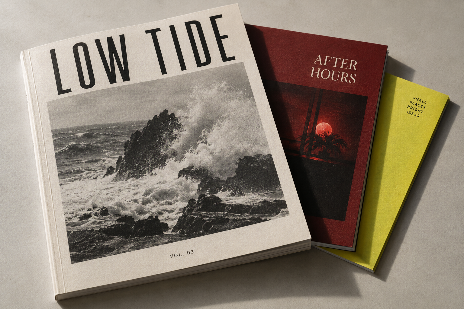 Low Tide, After Hours and a lemon yellow pamphlet stacked on an editor’s table